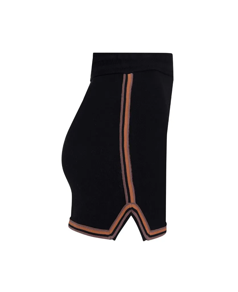 Certainly! Could you provide more details about the product or the existing title for the SYMBOL SKIRT? If you have any specific features or attributes that you want to highlight, such as fabric, style, color, or occasion, please let me know so I can help optimize the title effectively.